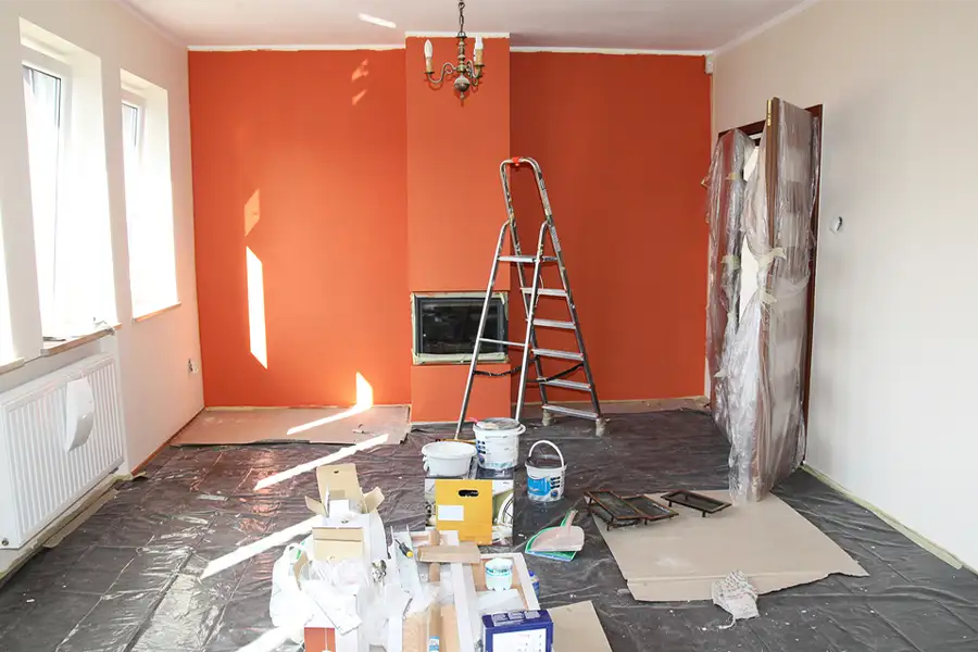 Handyman services -painting job in progress, bright orange, reddish color - Springfield, IL