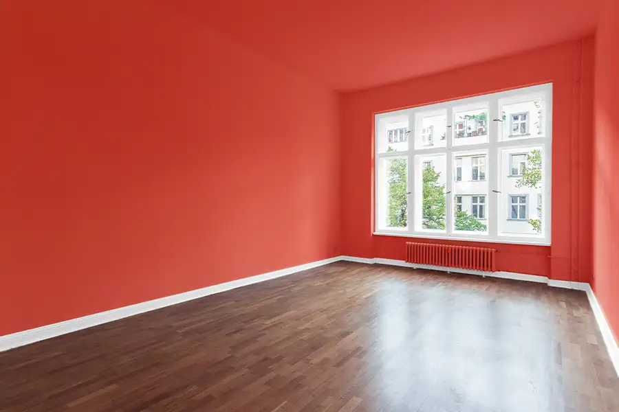 Handyman services - empty, freshly painted room, bright orange or red color - Springfield, IL